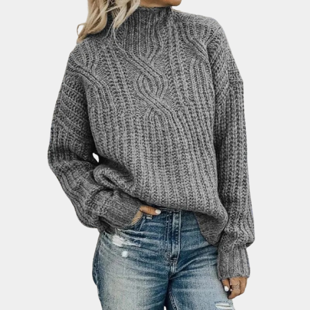 Grijze zacht gebreide damestrui, comfortabel en stijlvol design, perfect voor koude dagen, verkrijgbaar in diverse kleuren.