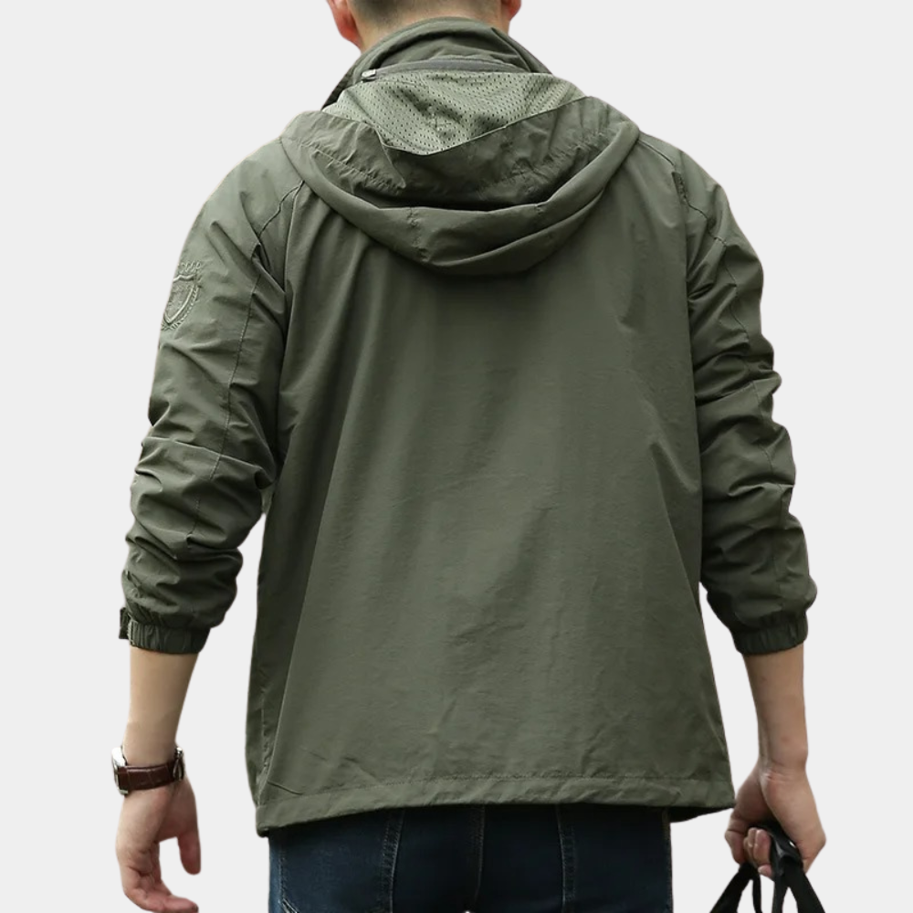 "Groene cargo zomerjas voor heren, lichtgewicht design, veelzijdig met praktische zakken, stijlvolle zomermode voor mannen."