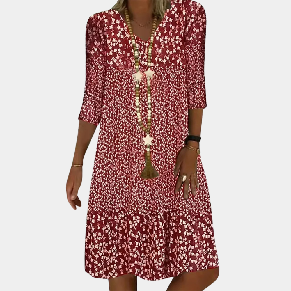 "Groene midi zomerjurk dames met V-hals en korte mouwen, elegante snit voor casual en chique gelegenheden."
