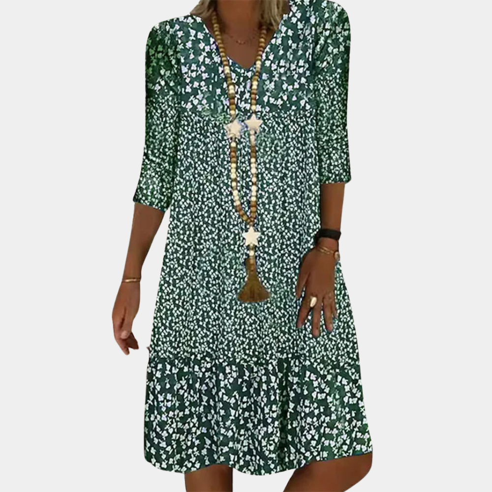 "Groene midi zomerjurk dames met V-hals en korte mouwen, elegante snit voor casual en chique gelegenheden."