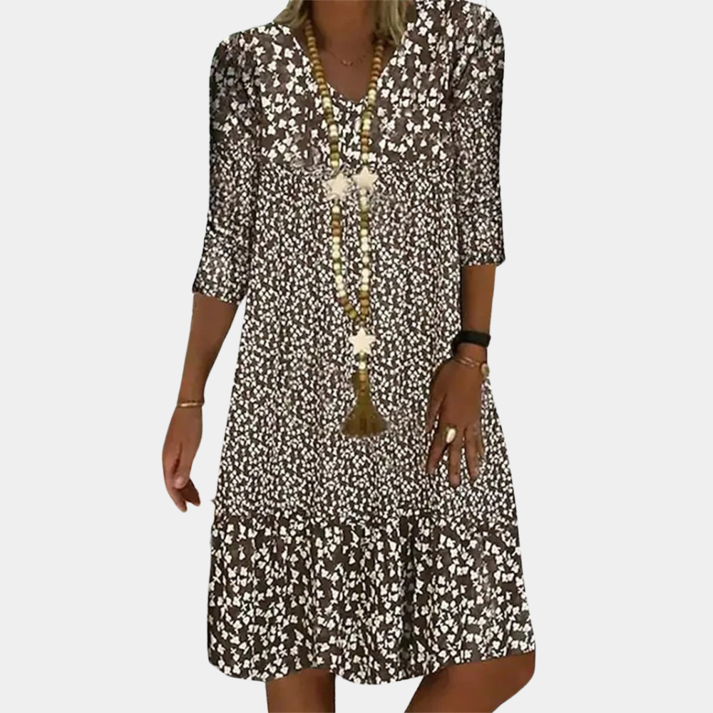 "Groene midi zomerjurk dames met V-hals en korte mouwen, elegante snit voor casual en chique gelegenheden."