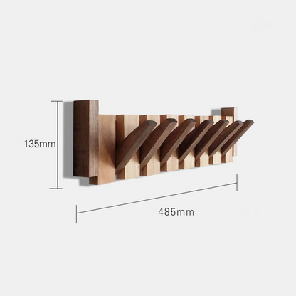 Handgemaakte houten kapstok in piano design met elegante, pianotoetsen uitstraling. Perfect voor stijlvolle jassenopslag.