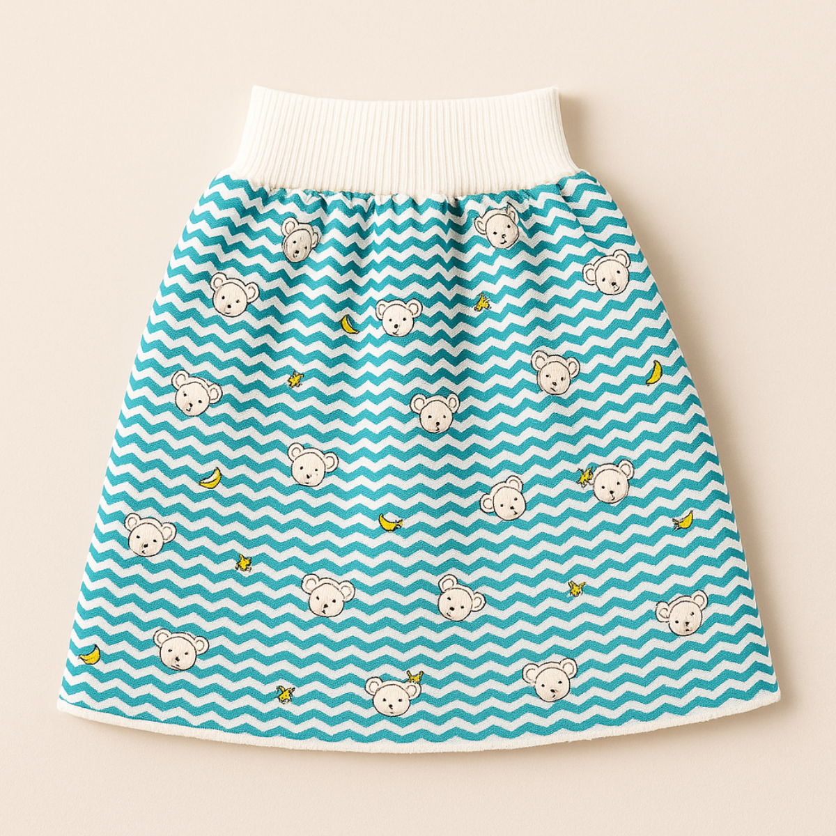 "Herbruikbare baby training pants, comfortabel en milieuvriendelijk, met schattige blauwe beertjes en roze hondjes patroon."