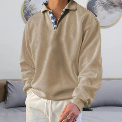 "Heren pullover met klassieke pasvorm in zwart, grijs, blauw en groen. Perfect voor casual en zakelijke outfits."