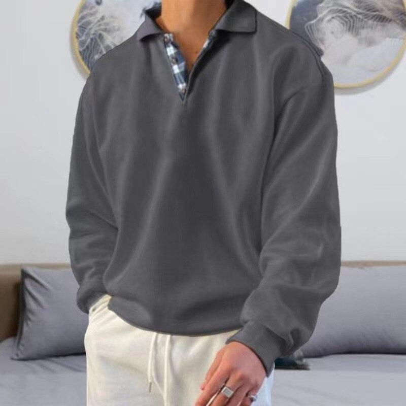 "Heren pullover met klassieke pasvorm in zwart, grijs, blauw en groen. Perfect voor casual en zakelijke outfits."