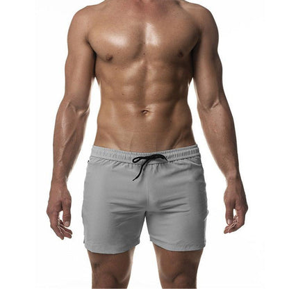 "Heren trainingszwemshort, sneldrogend en sportief ontwerp, elastische tailleband, ademende stof, zijzakken."