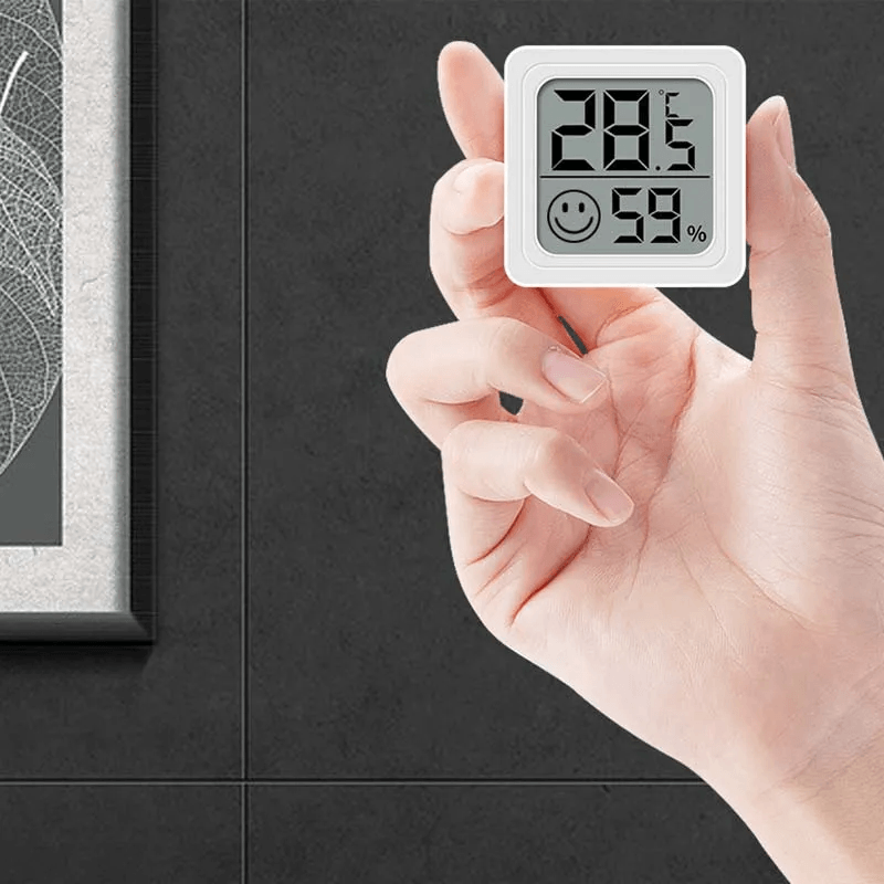 LCD thermometer hygrometer met digitaal scherm, toont temperatuur en luchtvochtigheid, stijlvol voor elk interieur.