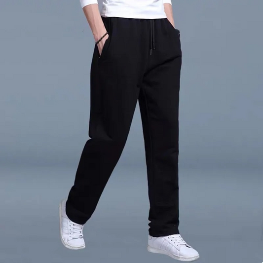 "Lichte heren joggingbroek, katoen, comfortabele pasvorm, elastische taille, moderne wijde pijpen, minimalistische stijl."