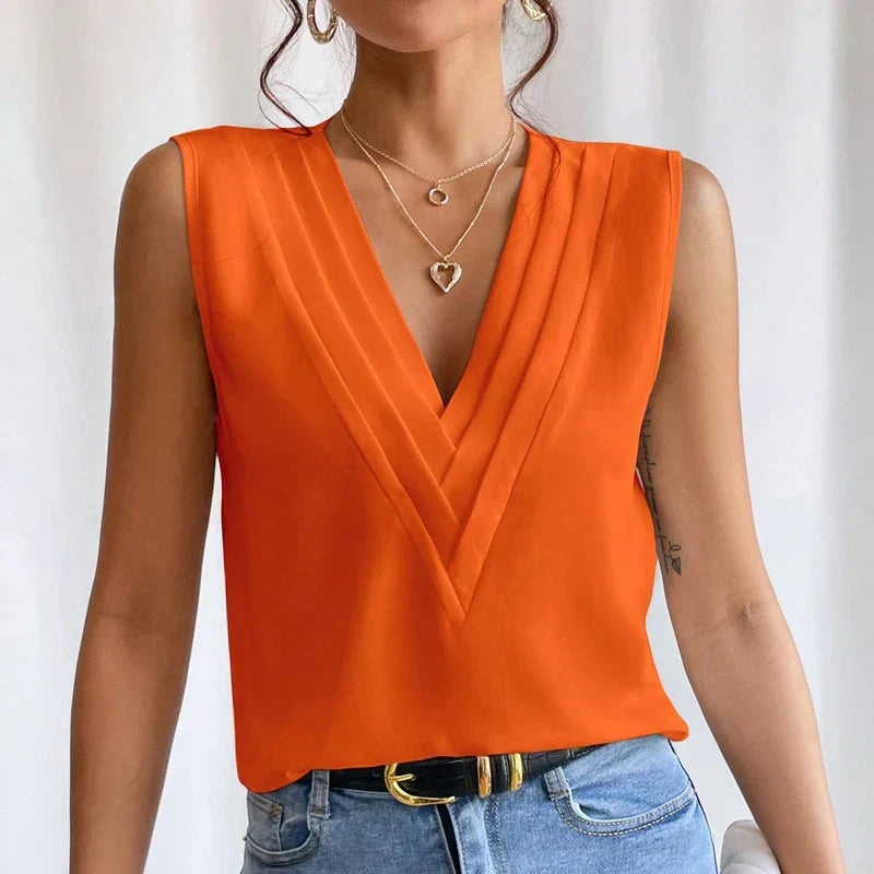 "Lichtgewicht elegante mouwloze damesblouse met V-hals, perfect voor zomerstijl en veelzijdige outfits."