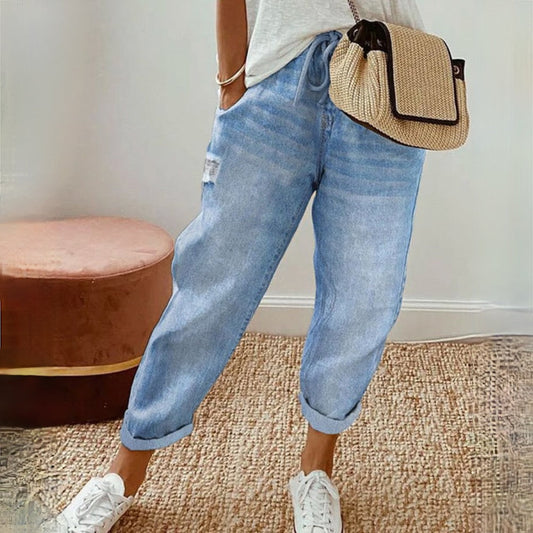 Luchtige boho zomerbroek van ademend katoen met elastische taille, loose-fit design en praktische zijzakken.