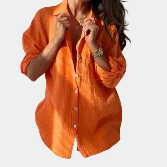 "Luchtige dames zomerblouse, kleurrijk in oranje, roze, grijs en blauwgroen, perfect voor casual en semi-formele looks."
