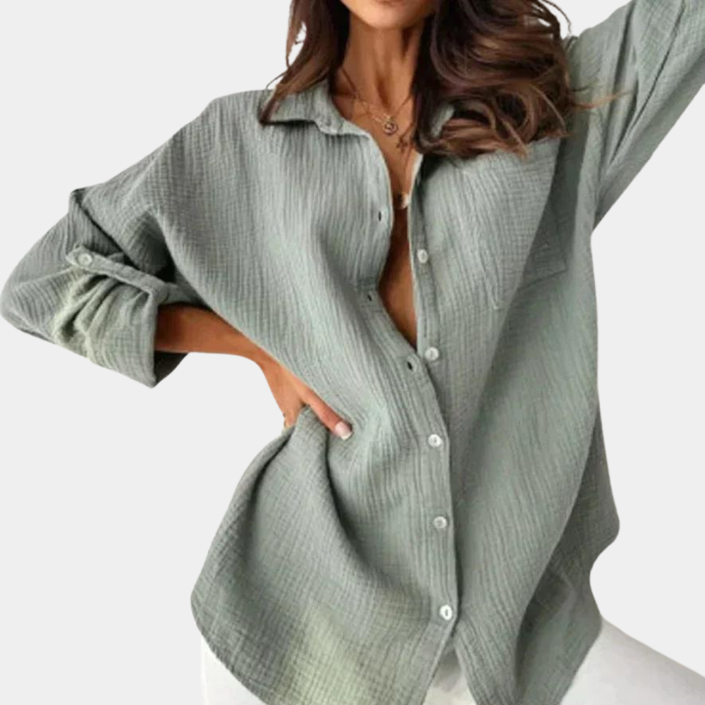 "Luchtige dames zomerblouse, kleurrijk in oranje, roze, grijs en blauwgroen, perfect voor casual en semi-formele looks."