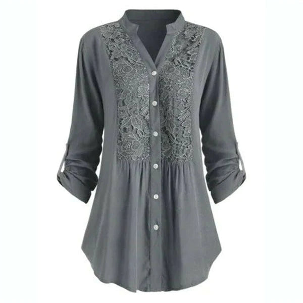 "Luchtige damesblouse met pofmouwen in zomerse stijl, elegante pasvorm, perfect voor casual en formele gelegenheden."