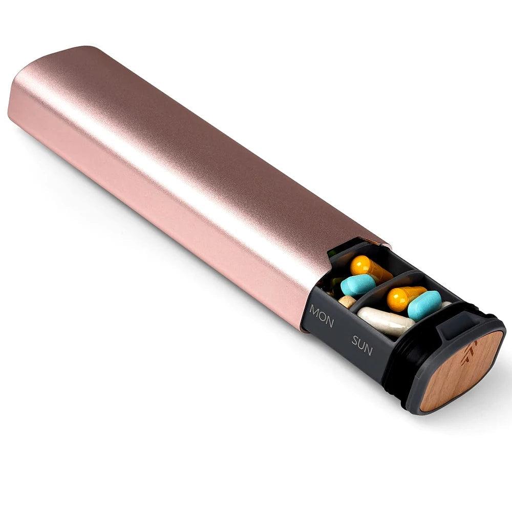 "Luxe aluminium en houten wekelijkse pillendoos voor medicijnorganisatie, compact en stijlvol, ideaal voor reizen."