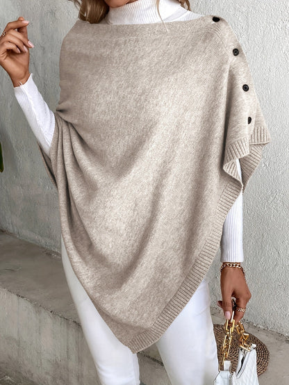 Luxe dames poncho met knoopsluiting, zachte stof, stijlvolle afwerking. Perfect voor casual en formele gelegenheden.