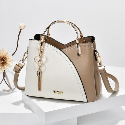 Luxe dames tote tas in leer met elegante lijnen, verkrijgbaar in trendy kleuren, perfect voor stijlvolle en moderne looks.