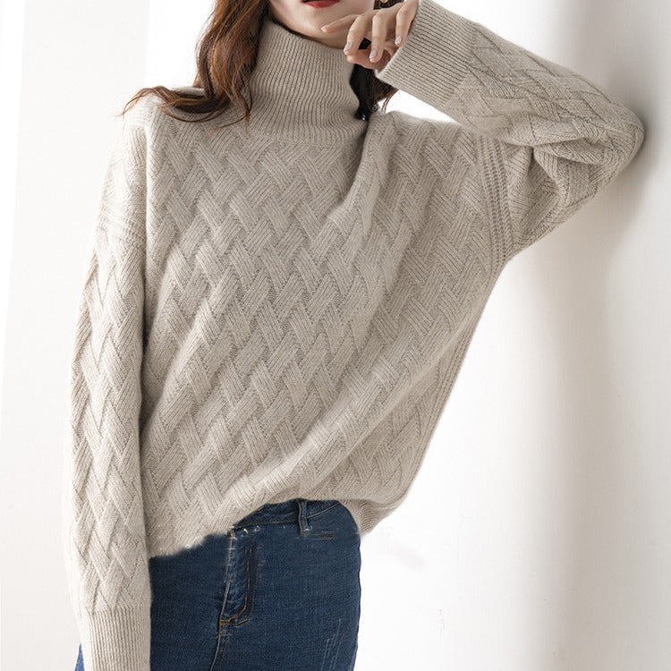 Luxe kasjmier trui dames, zacht en elegant, geschikt voor casual en formele outfits, in een warme grijze tint.