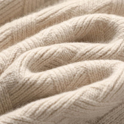 Luxe kasjmier trui dames, zacht en elegant, geschikt voor casual en formele outfits, in een warme grijze tint.
