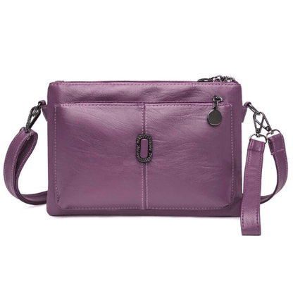Luxe leren schoudertas voor dames, elegant design met ruime compartimenten en hoogwaardige afwerking, in diverse kleuren.