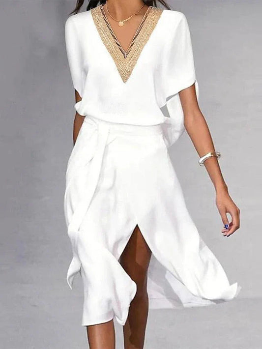 Luxe witte midi-jurk met chic V-hals, perfecte pasvorm, soepel vallende stof; elegant en veelzijdig voor elke gelegenheid.