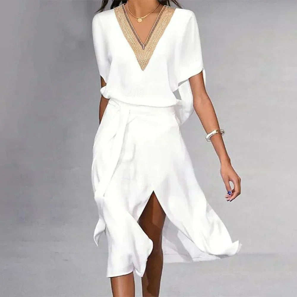 Luxe witte midi-jurk met chic V-hals, perfecte pasvorm, soepel vallende stof; elegant en veelzijdig voor elke gelegenheid.