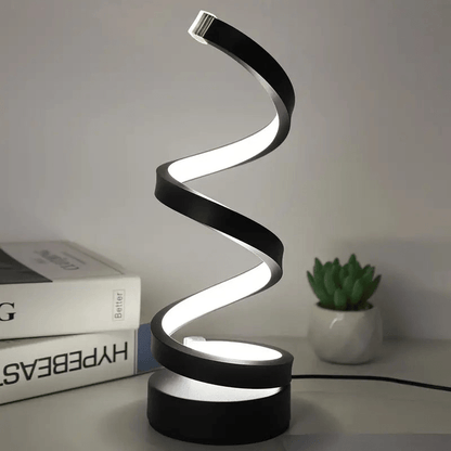 "Moderne dimbare LED tafellamp met spiraalvorm, elegant design, ideaal voor sfeervolle en energiezuinige verlichting."