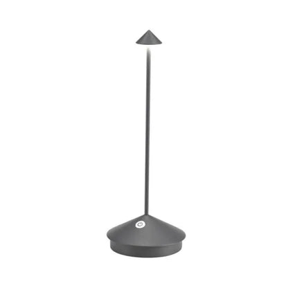 "Moderne draadloze LED tafellamp, dimbaar, waterbestendig, mat zwarte afwerking, voor binnen en buiten gebruik."