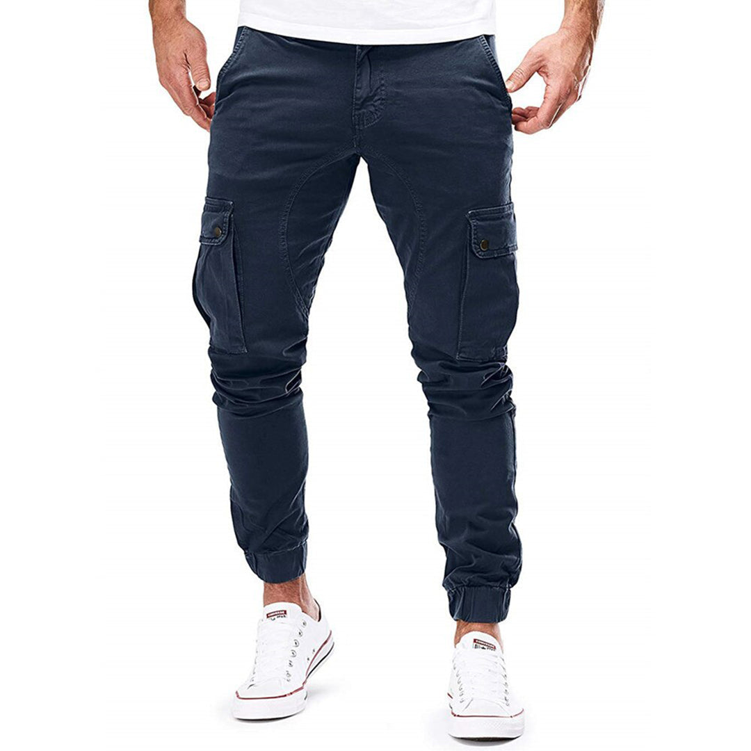 "Moderne heren cargo broek met elastische taille, ruime zakken en trendy ontwerp voor comfort en stijl."