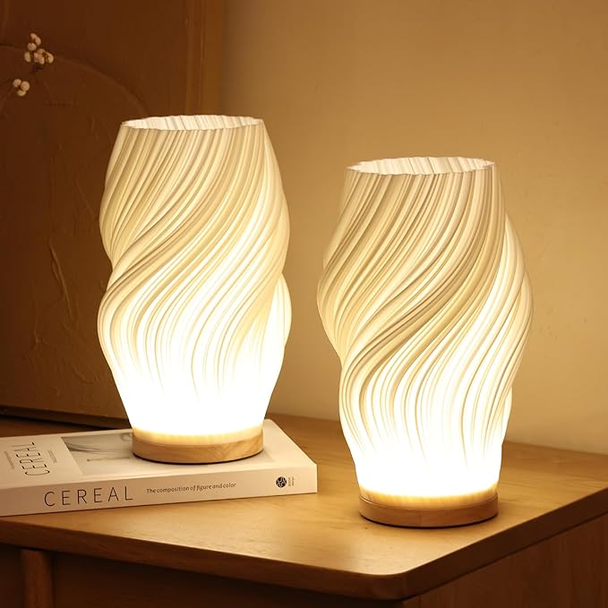 "Moderne LED tafellamp met uniek swirl design, zachte warme gloed. Perfect voor bureau, nachtkastje of boekenplank."