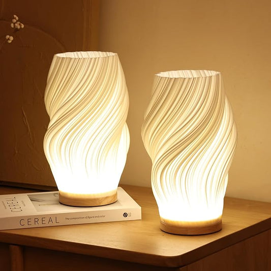 "Moderne LED tafellamp met uniek swirl design, zachte warme gloed. Perfect voor bureau, nachtkastje of boekenplank."