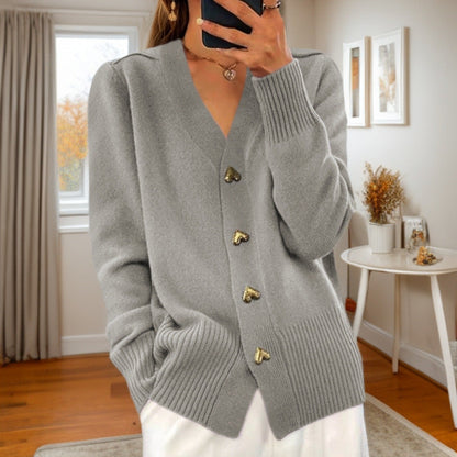 Mouwloos gebreid vest voor dames in beige en grijs, stijlvol en comfortabel met zakken, perfect voor elk seizoen.