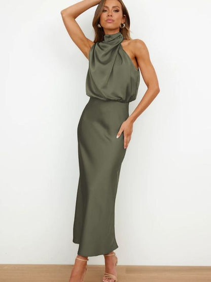 "Mouwloze Milou cocktailjurk, elegant satijn, off-shoulder, bodycon fit, maxi-lengte, perfecte voor avondfeest."