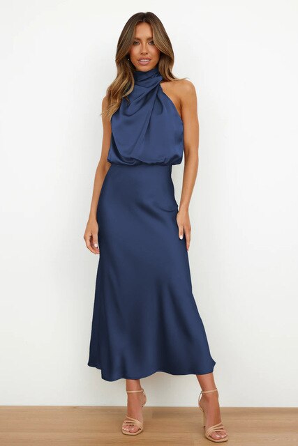 "Mouwloze Milou cocktailjurk, elegant satijn, off-shoulder, bodycon fit, maxi-lengte, perfecte voor avondfeest."