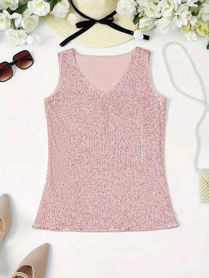 "Mouwloze top met V-hals, pailletten, elegante uitstraling, lichte stof; perfect voor zomer en avondjes uit."