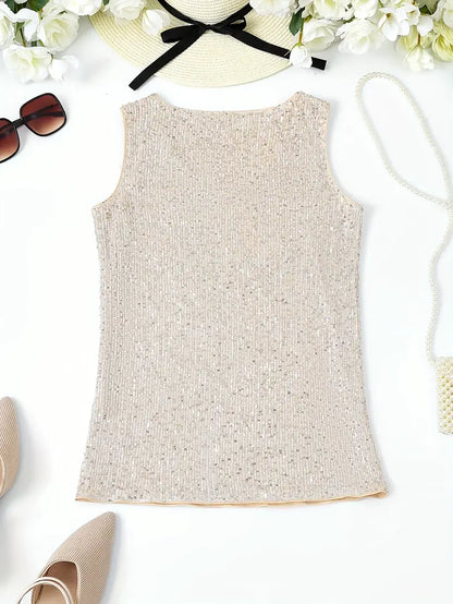 "Mouwloze top met V-hals, pailletten, elegante uitstraling, lichte stof; perfect voor zomer en avondjes uit."