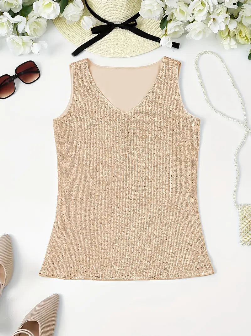 "Mouwloze top met V-hals, pailletten, elegante uitstraling, lichte stof; perfect voor zomer en avondjes uit."
