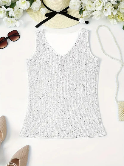 "Mouwloze top met V-hals, pailletten, elegante uitstraling, lichte stof; perfect voor zomer en avondjes uit."