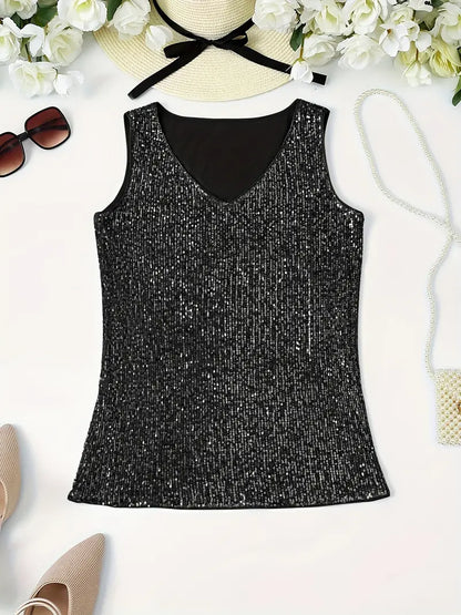 "Mouwloze top met V-hals, pailletten, elegante uitstraling, lichte stof; perfect voor zomer en avondjes uit."