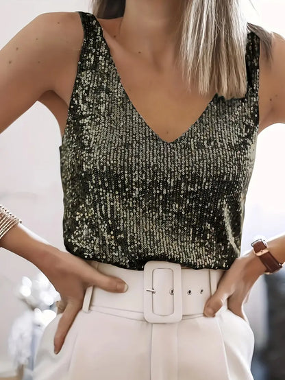 "Mouwloze top met V-hals, pailletten, elegante uitstraling, lichte stof; perfect voor zomer en avondjes uit."