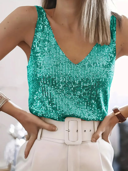 "Mouwloze top met V-hals, pailletten, elegante uitstraling, lichte stof; perfect voor zomer en avondjes uit."