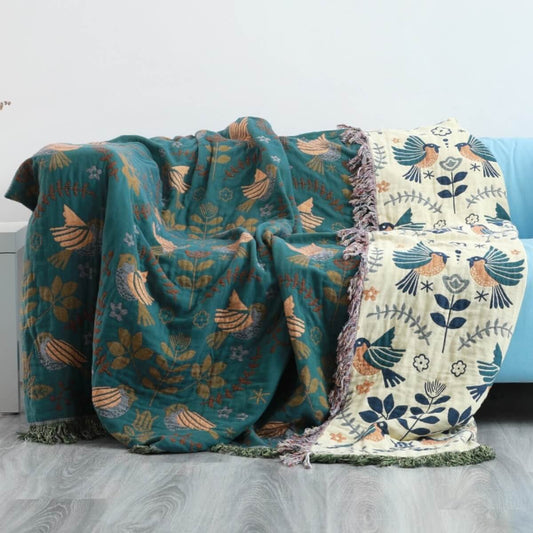 "Omkeerbaar Scandinavisch dekentje met dubbelzijdig design en stijlvolle patronen voor comfort en flair in elke ruimte."