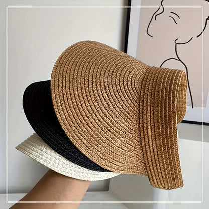 "Opvouwbare zonneklep met brede rand, beige, zwart of navy, biedt stijl en zonbescherming voor zonnige dagen."
