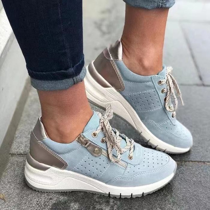 "Orthopedische dames wandelschoenen in blauw, grijs, groen, en zwart met brede teenbox en verstelbare vetersluiting."