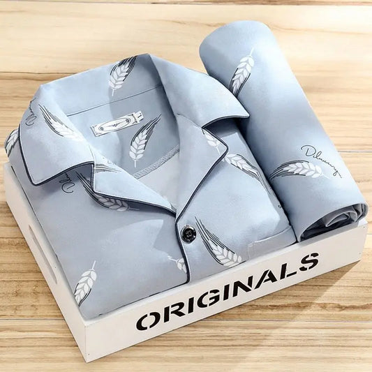 "Pyjama set voor mannen met knoopsluiting, stijlvol gestreept patroon en zachte stof voor ultiem slaapcomfort."
