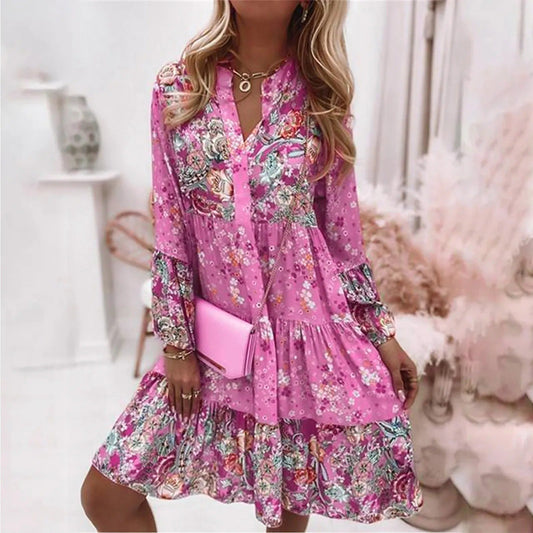 Roze elegante zomerjurk voor vrouwen met vloeiende snit en luchtige stof, perfect voor stijlvolle zomerse dagen.