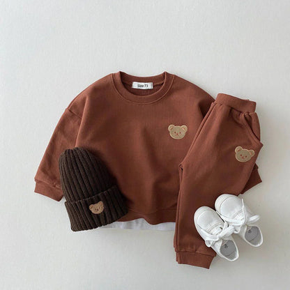 "Schattige berenprint kinderset van zacht katoen in diverse kleuren, ideaal voor comfort en stijl bij kinderen."