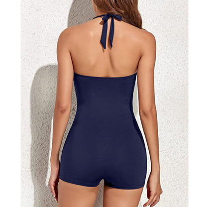 "Sneldrogend sportief badpak met boyleg design, flatterende pasvorm, donkerblauw met subtiele stiksels, ideaal voor zomer."