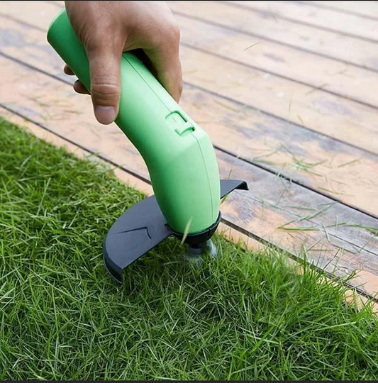 "Snoerloze heggenschaar voor precies snoeien, ergonomisch ontwerp, lichte bouw, groene handgreep en scherpe messen."