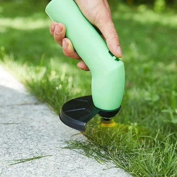 "Snoerloze heggenschaar voor precies snoeien, ergonomisch ontwerp, lichte bouw, groene handgreep en scherpe messen."