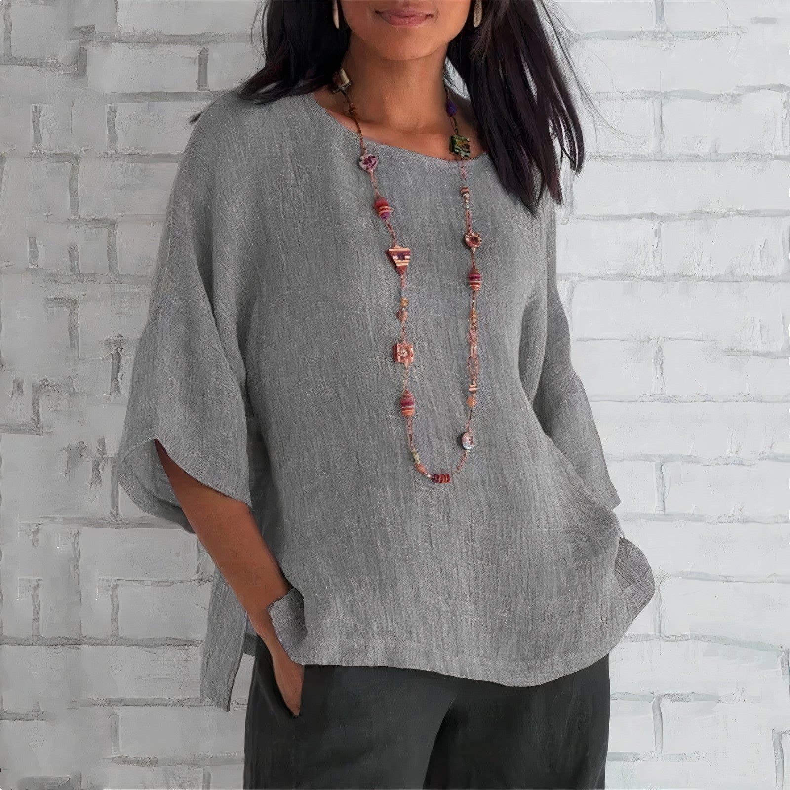 "Stijlvolle ademende linnen blouse voor vrouwen in blauw, geel of grijs, ideaal voor casual en formele outfits."